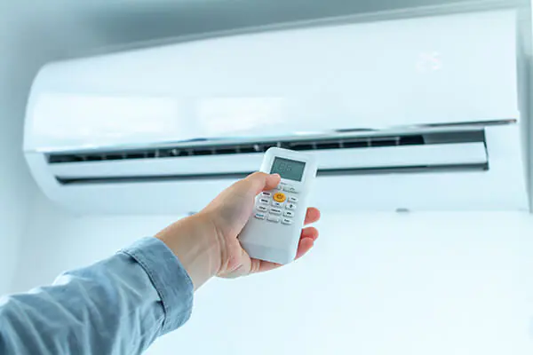 Domestic wall-mounted air conditioning unit in a modern home